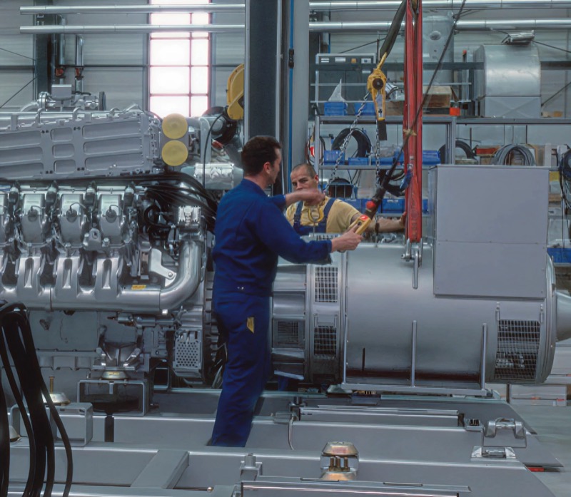 Engineers running an industrial power plant on the workshop floor